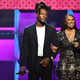 DeAndre Hopkins (L) and Sabrina Greenlee speak onstage during the BET Super Bowl Gospel Celebration at the James L. Knight Center on January 30, 2020 in Miami, Florida.